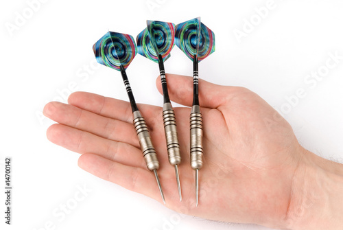 Arrows darts in hand isolated on white background photo