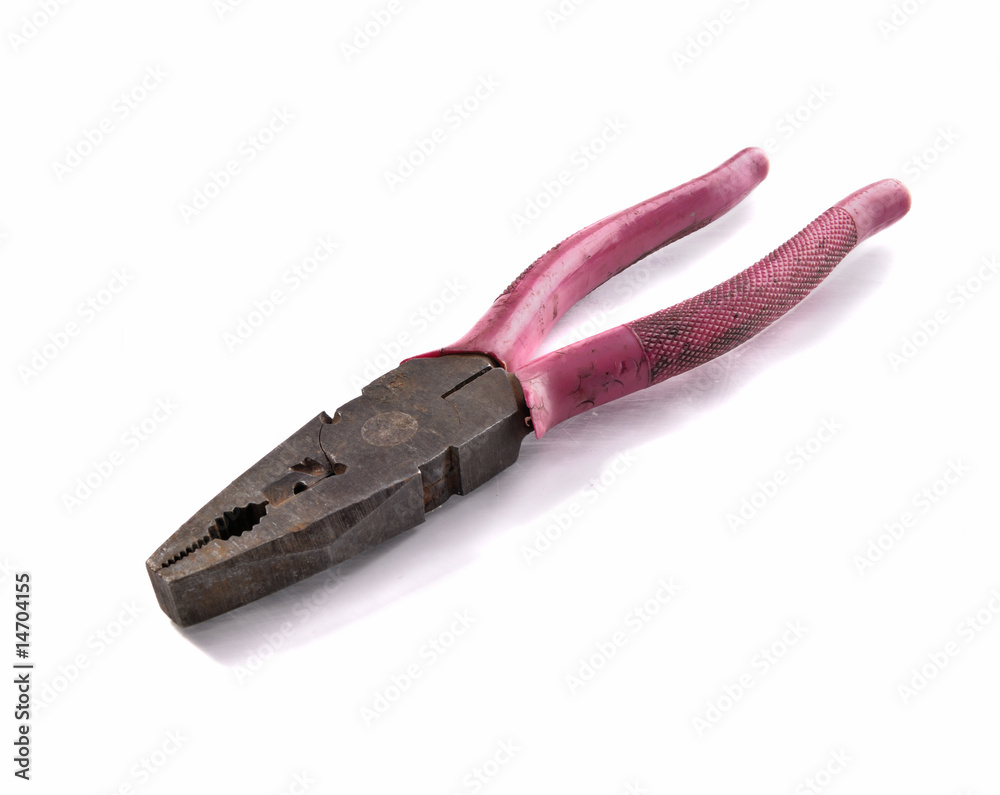 Old and rusty pliers with pink aged handlers Old and rusty pliers with pink aged handlers
