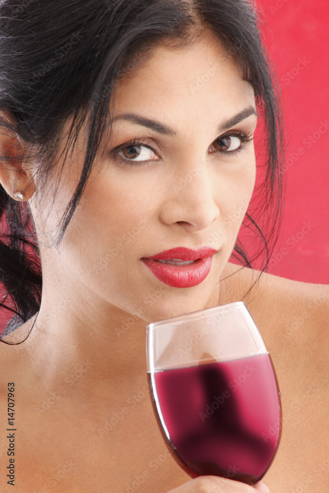 Cute brunette drinking red wine Cute brunette drinking red wine