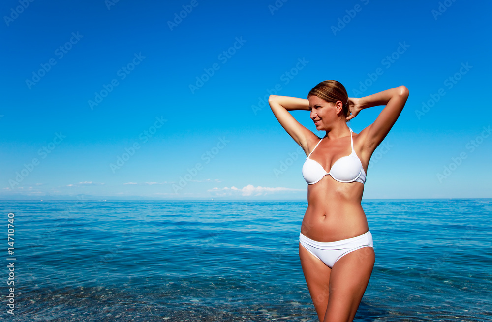 Photograph of a beautiful woman on the beach