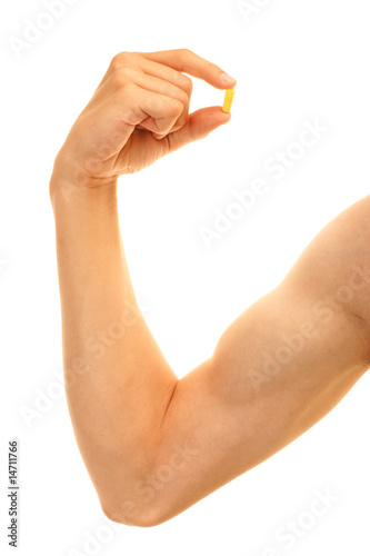 Man biceps hand holding steroids capsule