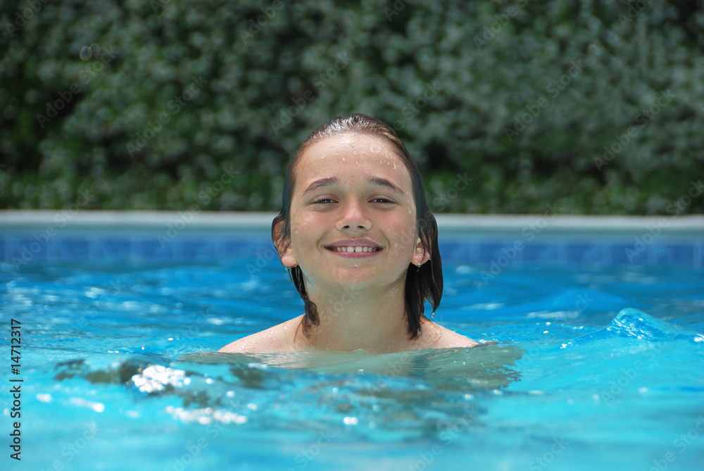 Smiling Teen in Swimming Pool