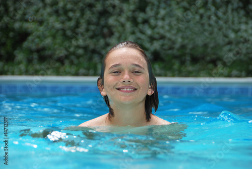 Smiling Teen in Swimming Pool