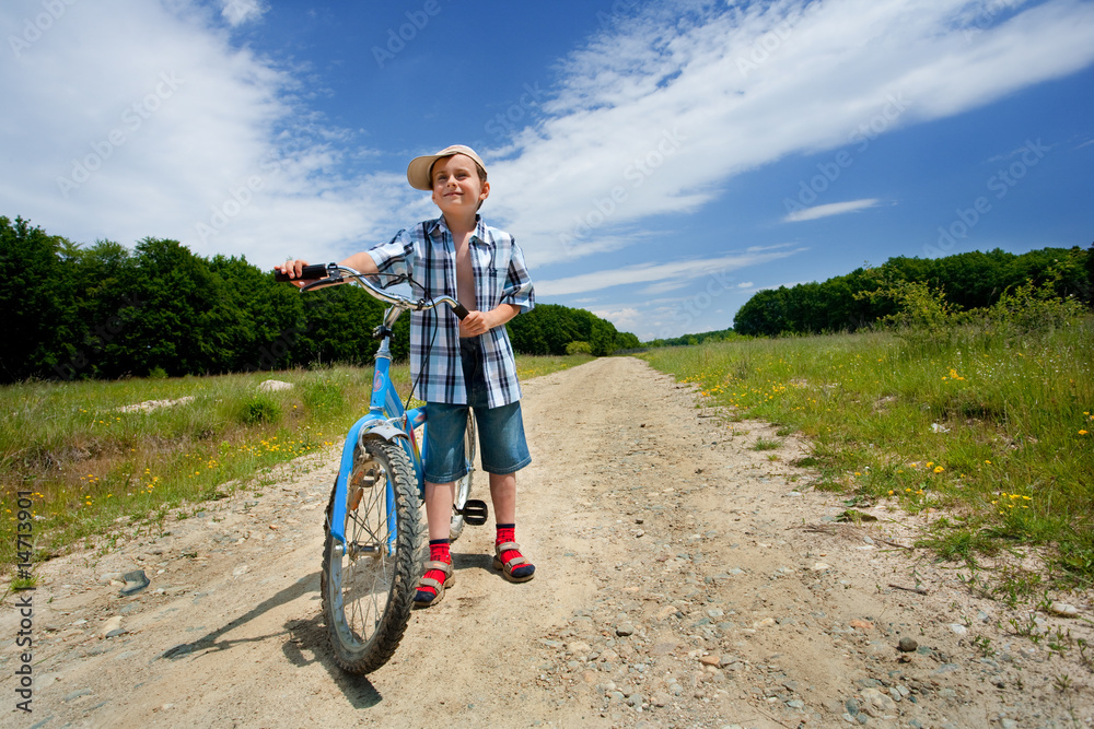 Naklejka premium Boy with bike