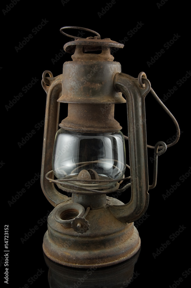 Old lamp on the black background Old lamp on the black background