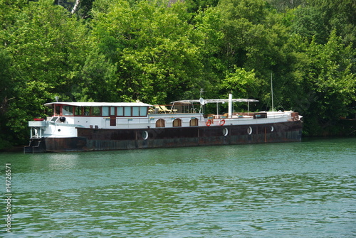 Schilderij op canvas péniche amarée