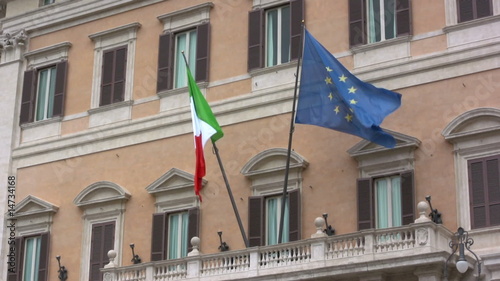 Italian and EU flags fluttering in Rome