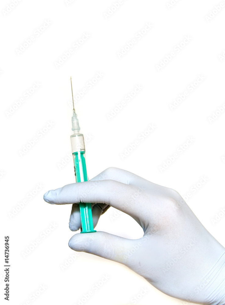 Syringe in hand Syringe in hand