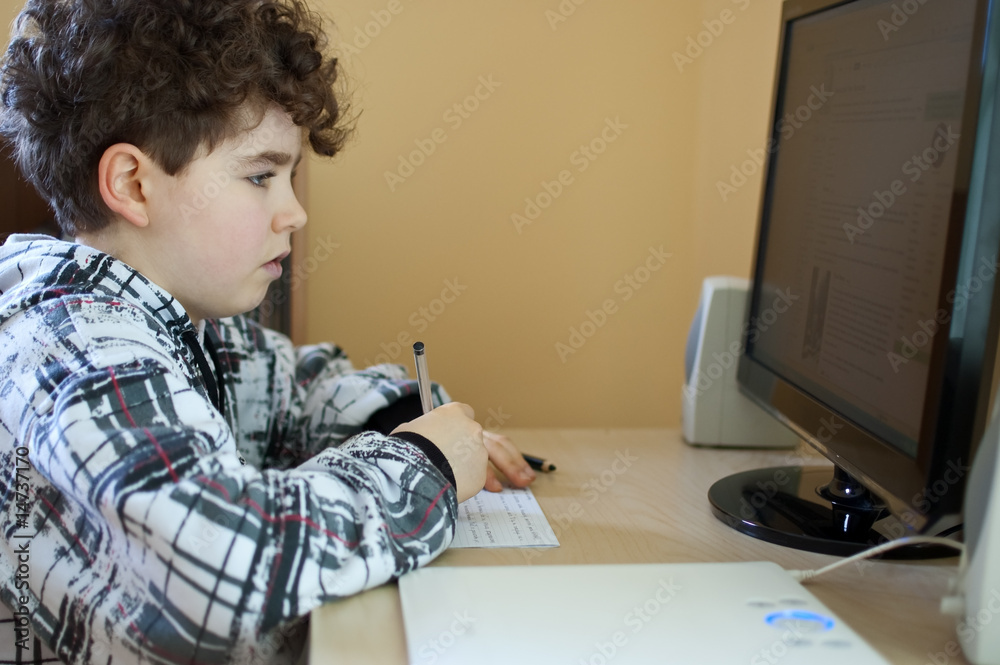 Boy doing homework Boy doing homework