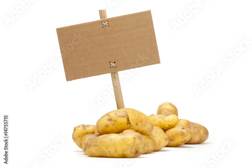 pommes de terre primeur et message sur fond blanc photo