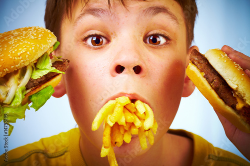 Vászonkép child and fast food.