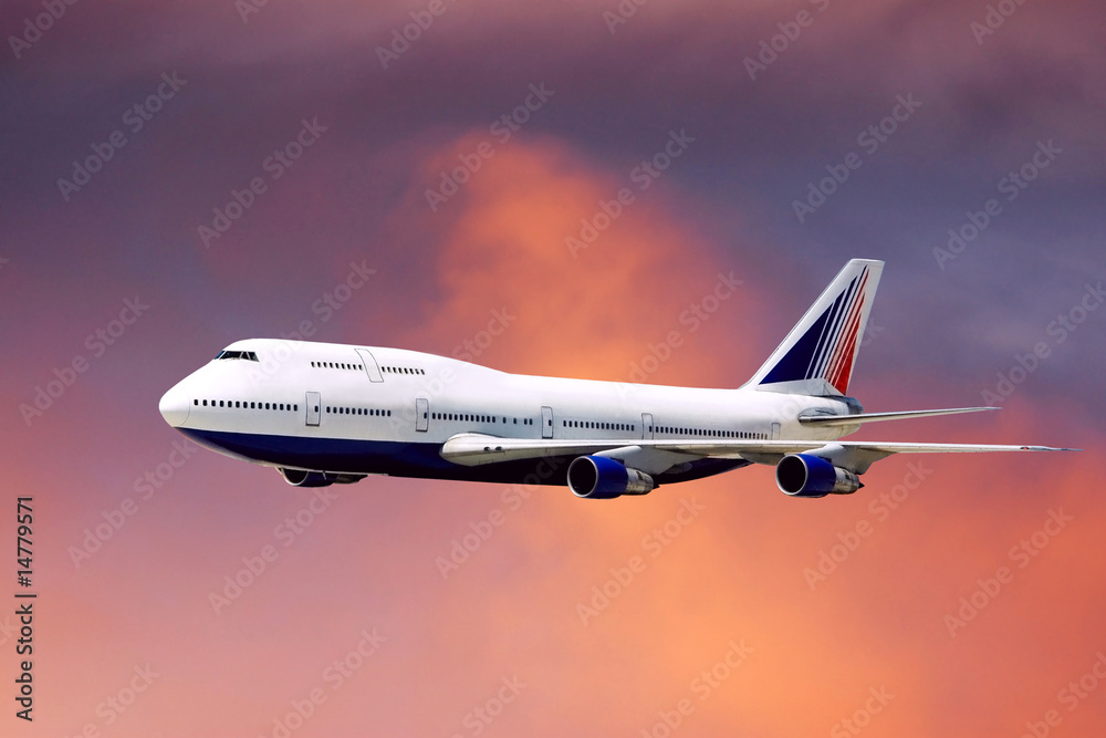 Fototapeta premium airplane in air on sunrise sky