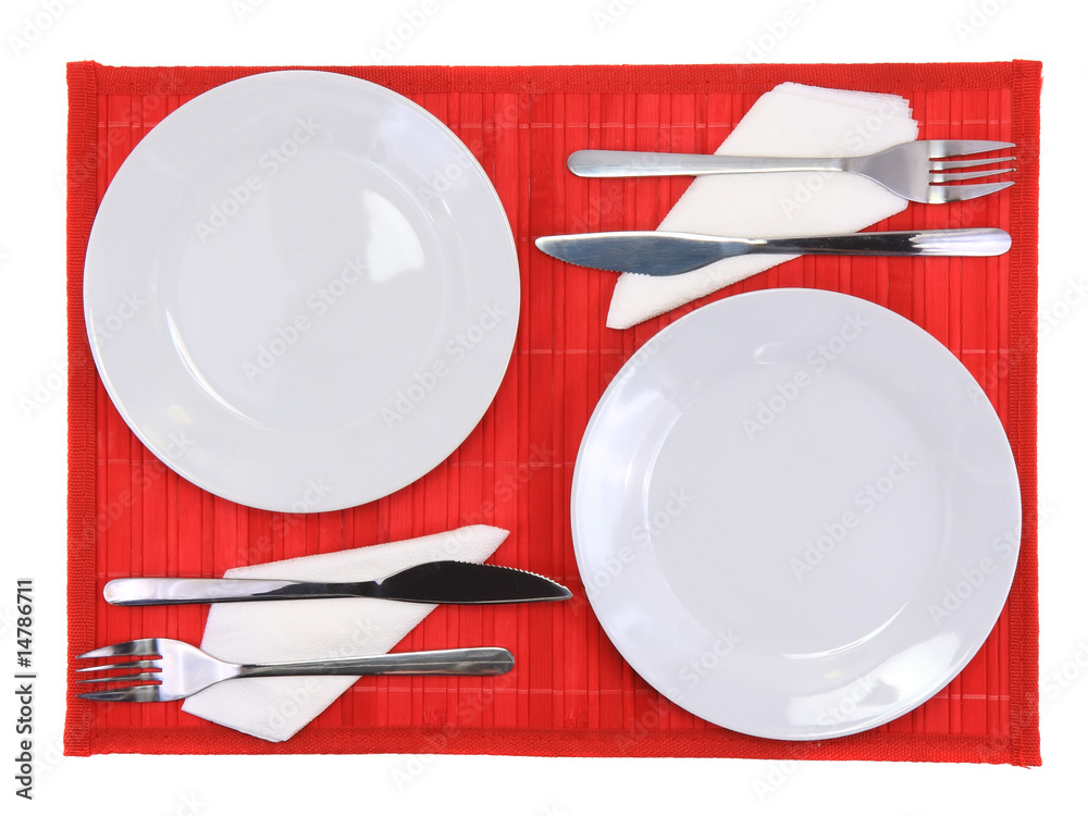 Table appointments(arrangement) of flatware on bamboo mat. Table appointments(arrangement) of flatware on bamboo mat.