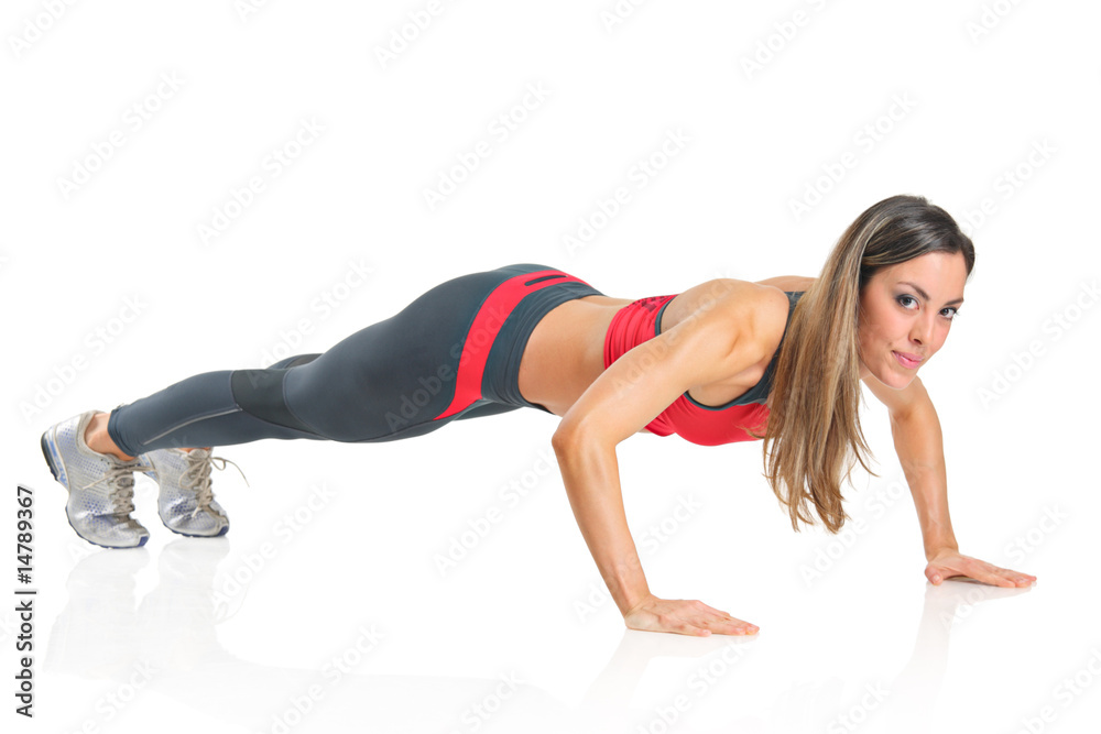 Beautiful girl exercising isolated on white Beautiful girl exercising isolated on white