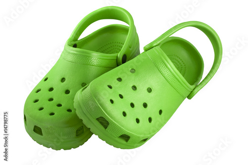 Obraz na plátně bright green plastic clogs