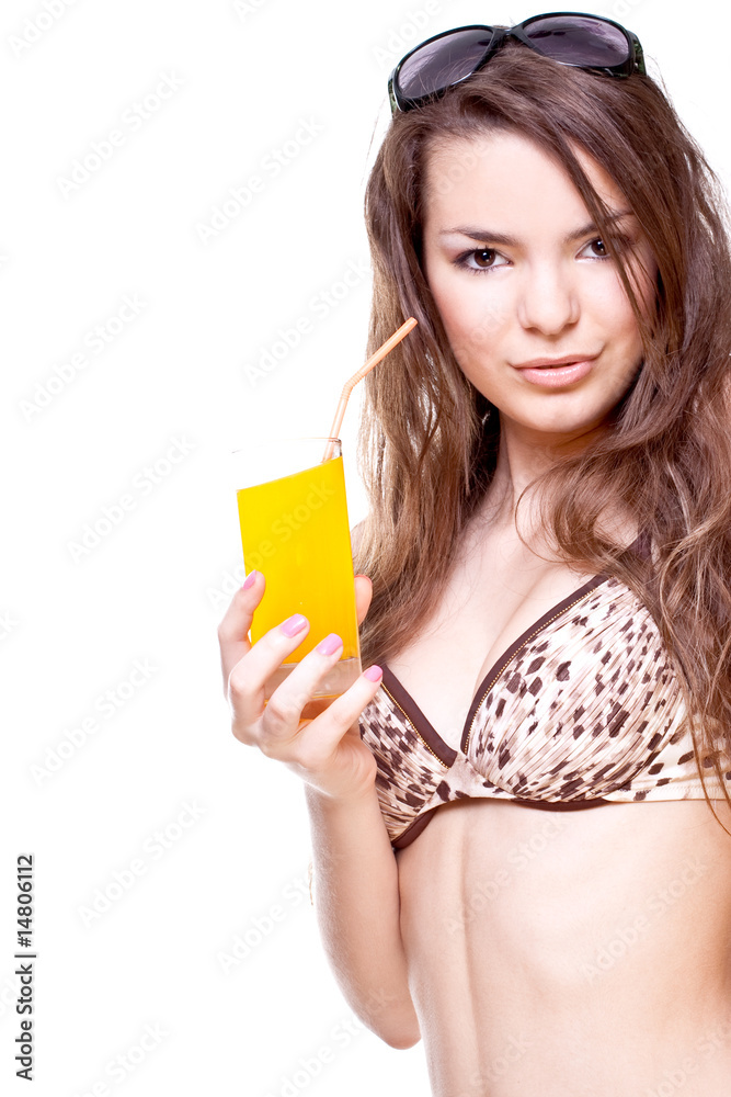 beautiful women in swimsuit with a glass of juice beautiful women in swimsuit with a glass of juice