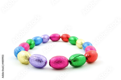 Easter eggs in a circle isolated on white background