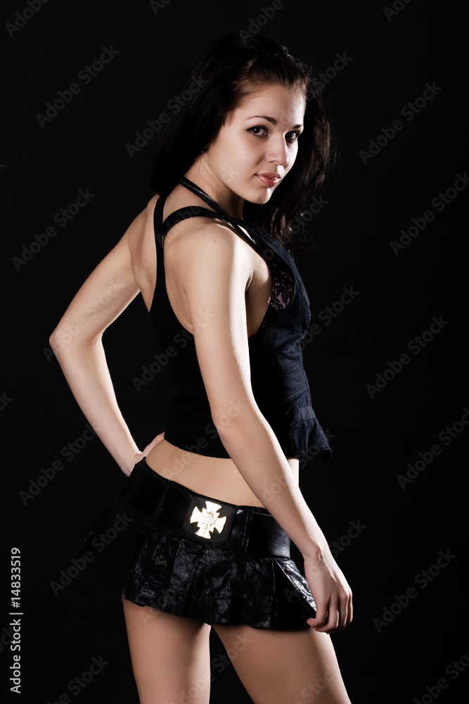 Sexy brunette in mini skirt Stock Photo | Adobe Stock