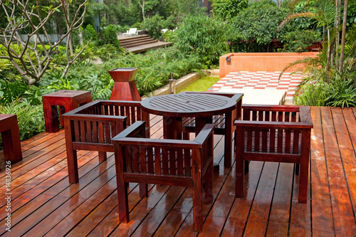 House patio with wooden table and chairs