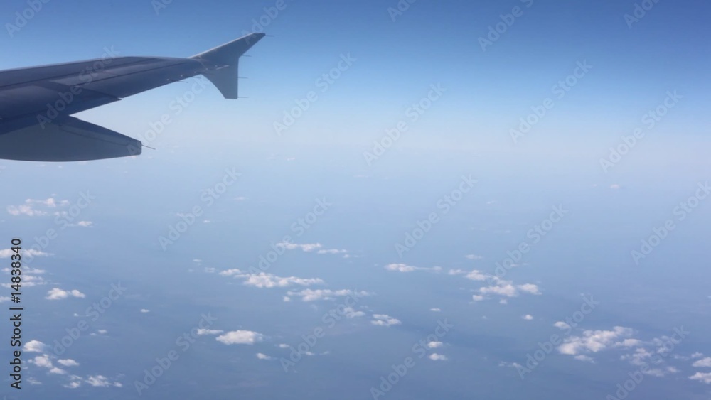 Tip of wing of plane in the sky Tip of wing of plane in the sky
