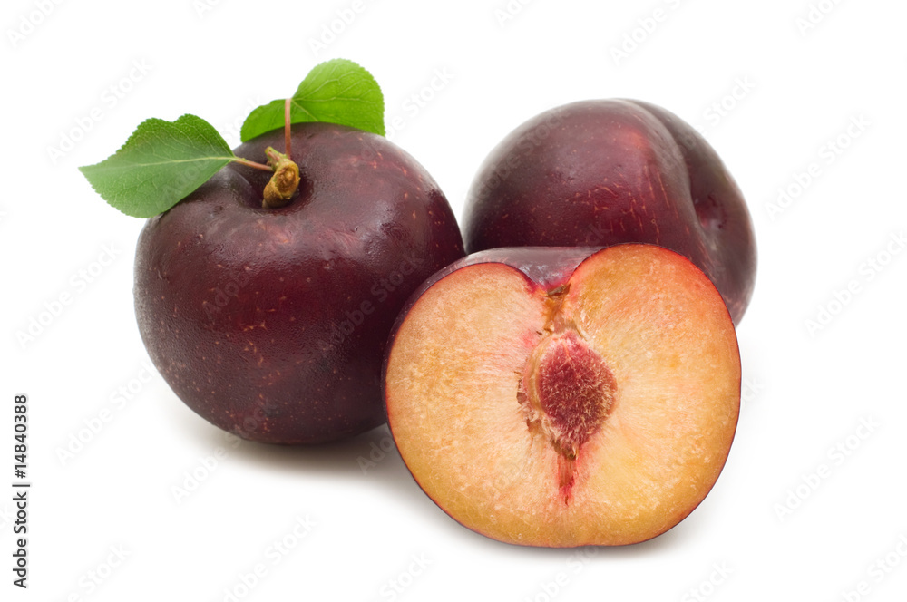 three plum on white background