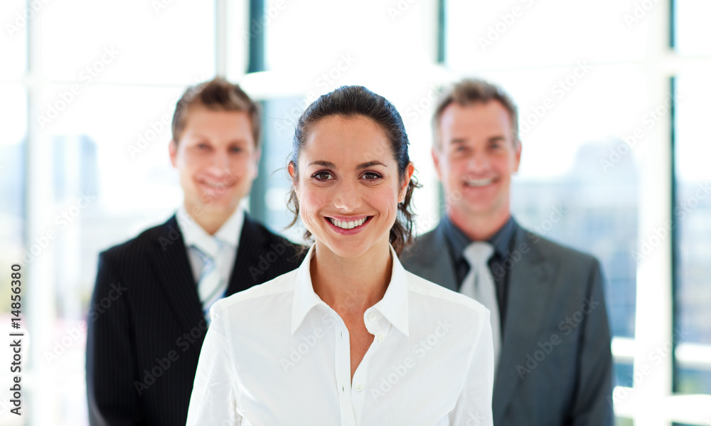 Smiling businesswoman with her team Smiling businesswoman with her team