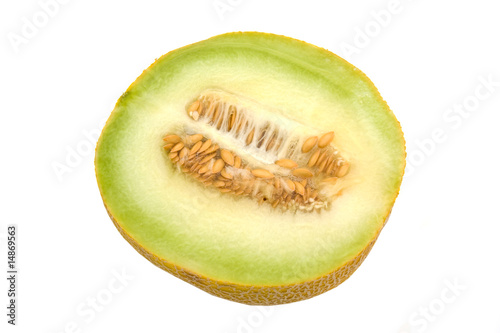 yellow melon in half isolated on white background
