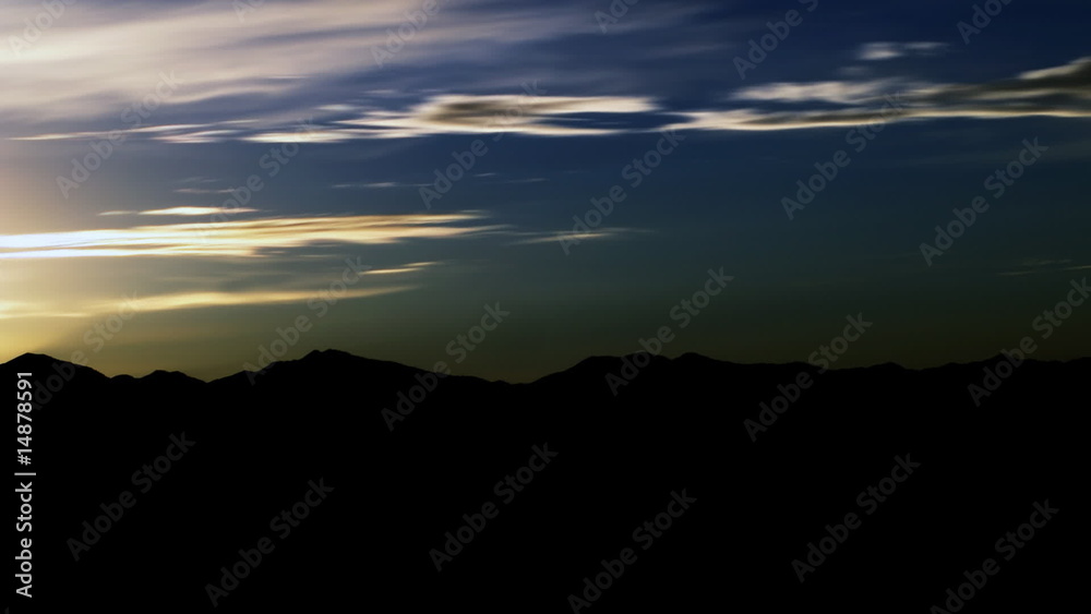 Time-lapse shot of the mountain tops at dusk in Utah Time-lapse shot of the mountain tops at dusk in Utah