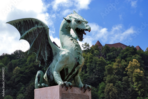 Dragon at Zmajski Most with castle Slovenia Ljubljana photo