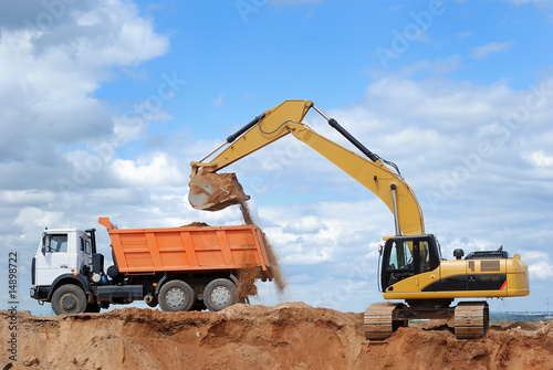 Excavator and rear-end tipper