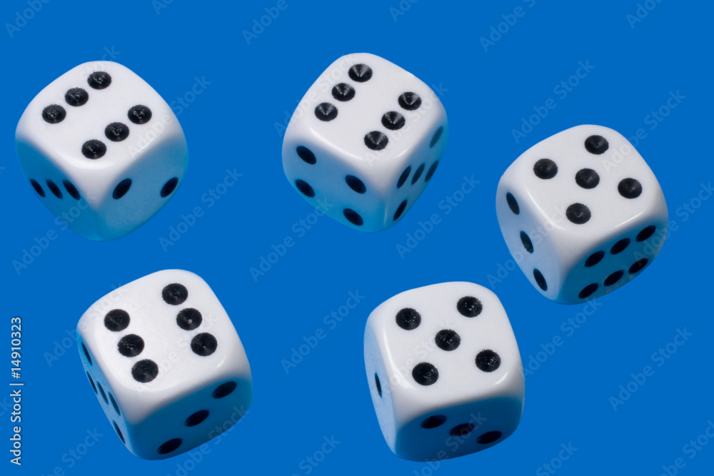 Five white dices against a blue background Five white dices against a blue background
