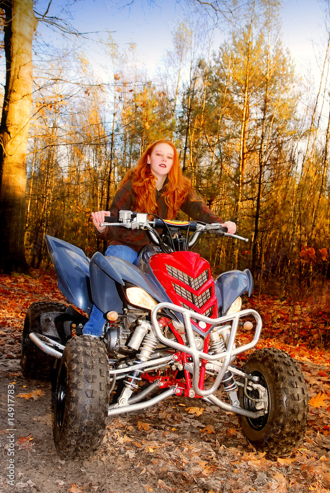 teenage girl on quadbike