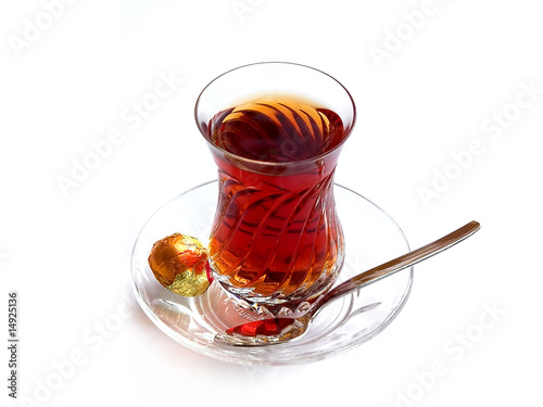 Turkish tea with a piece of chocolate