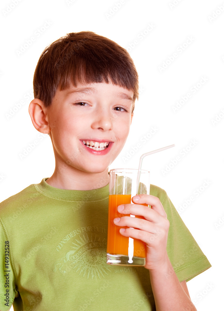 Smiling boy with a glass of juice Smiling boy with a glass of juice