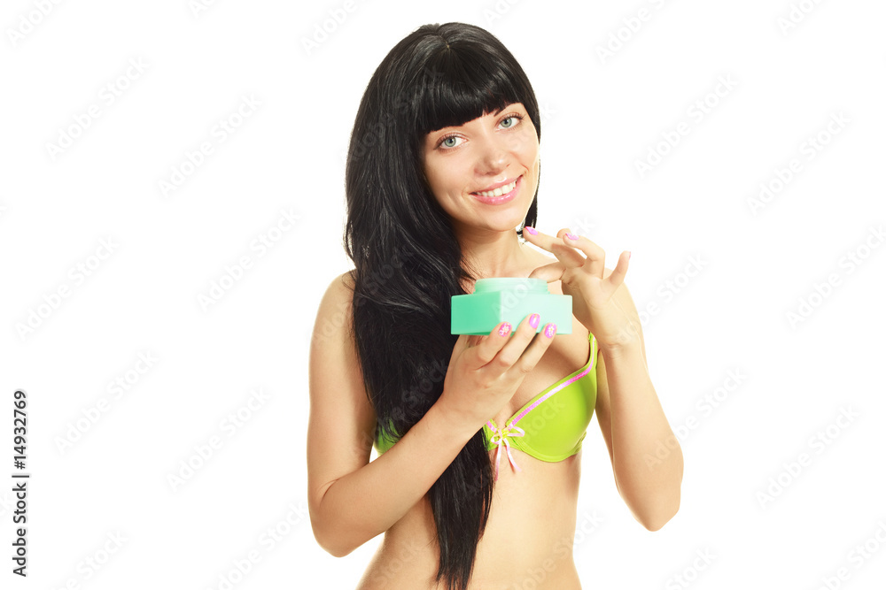 girl applying cosmetics girl applying cosmetics