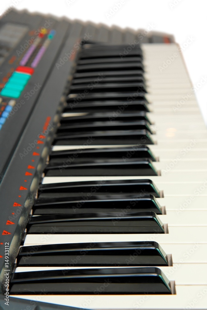 Keyboard of electric piano in perspective isolated Keyboard of electric piano in perspective isolated