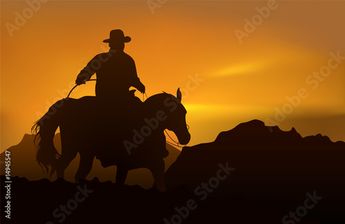 Cowboy over sunset