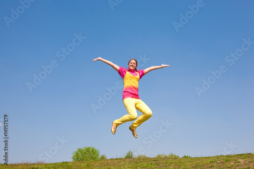 Happy smiling girl - jumping