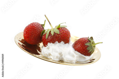 strawberry in a golden plate photo