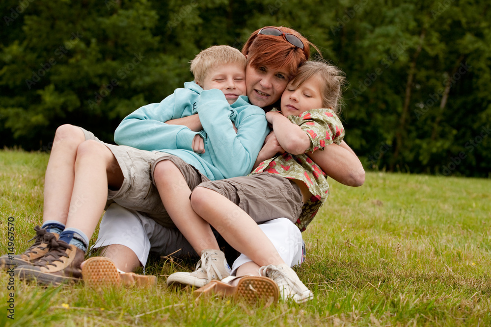 Fototapeta premium Mother and her 2 kids