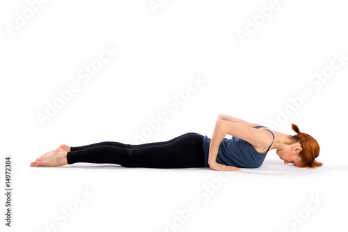 Fit Woman Practising Yoga © Artur Bogacki