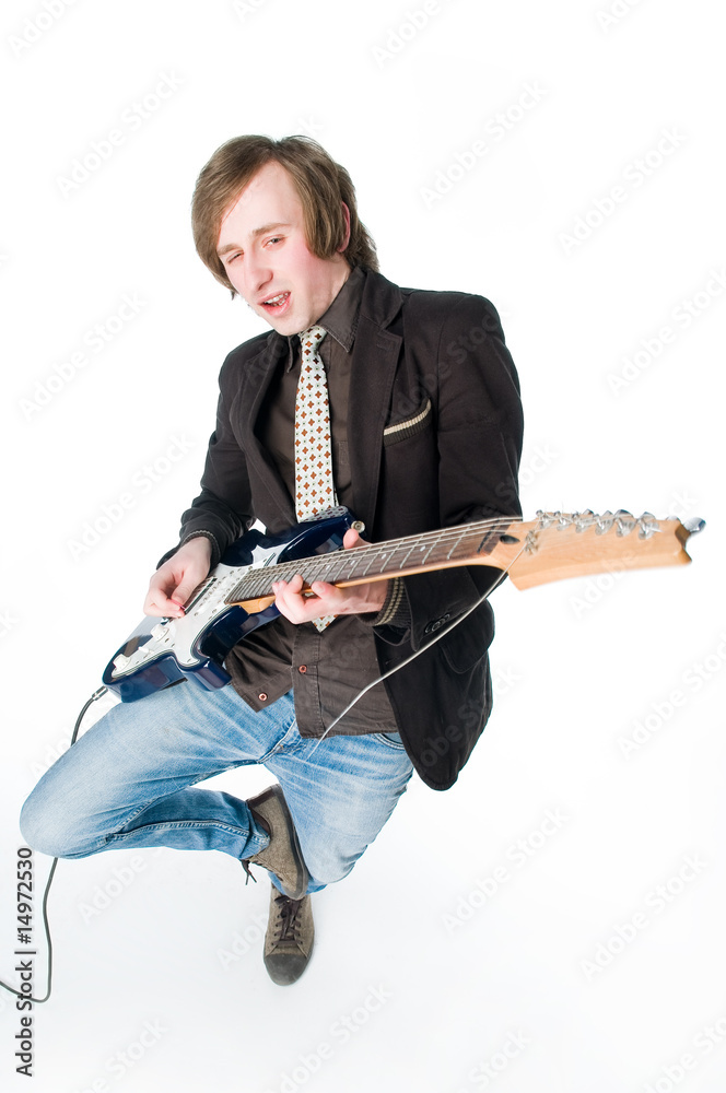 Fototapeta premium Crazy man playing electro guitar