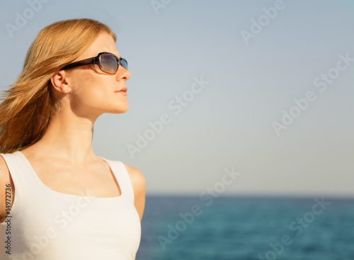 Beautiful girl relaxing on the beach © LazyFocus