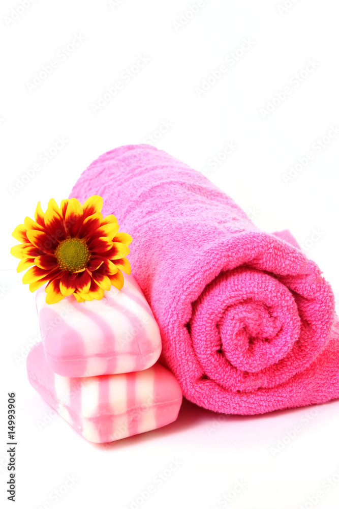 soap, flower and towel on white soap, flower and towel on white