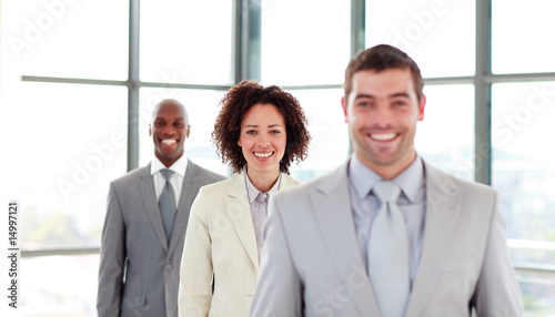 Smiling young businesswoman in a row photo