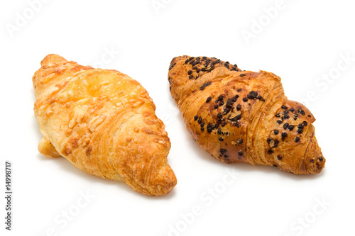 fresh baked croissants isolated on white background