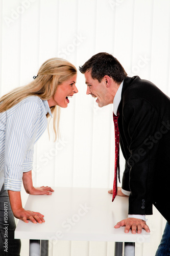 Dispute among employees at work in the office