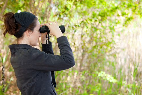 woman using binoculars