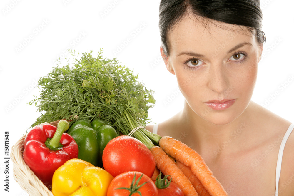 Portrait of young woman with basket with vegetables Portrait of young woman with basket with vegetables
