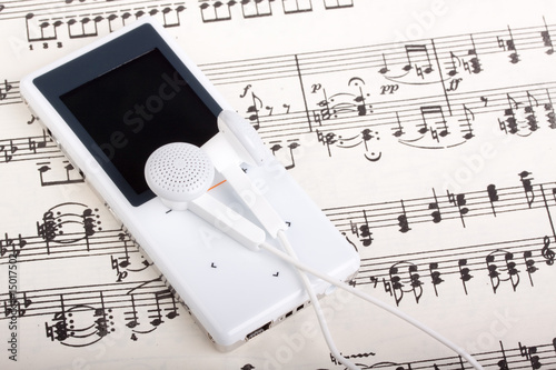 Obraz na płótnie MP3 player and note